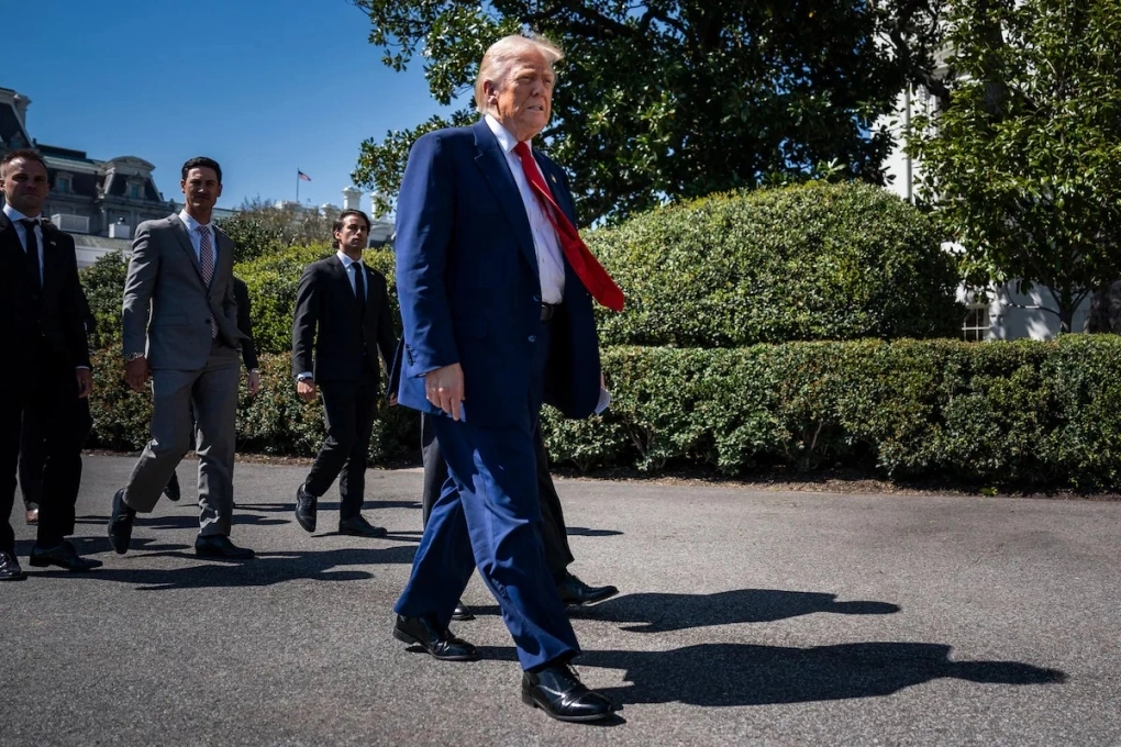 trump thay doi chinh sach thue quan 1